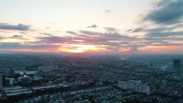 Aerial view of a city at sunset