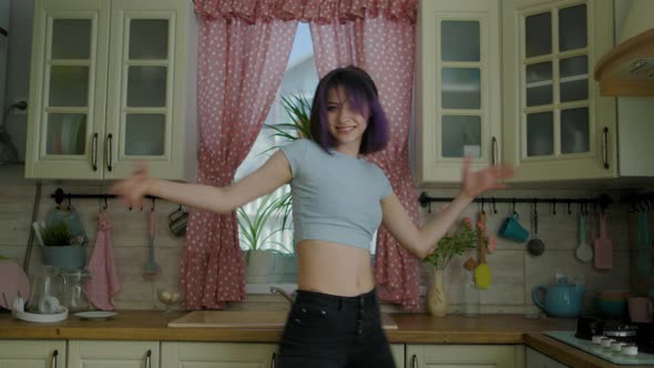 Young Beautiful Woman Dancing Kitchen At Home alt