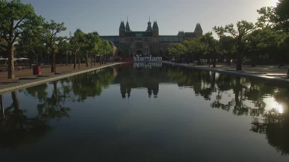 View of National Museum Rijksmuseum at the Museumplein, Amsterdam, Netherlands alt