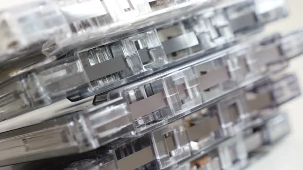 Music archives on  compact cassettes 4K 2160p 30fps UltraHD panning   footage - Slow pan on stacked  alt