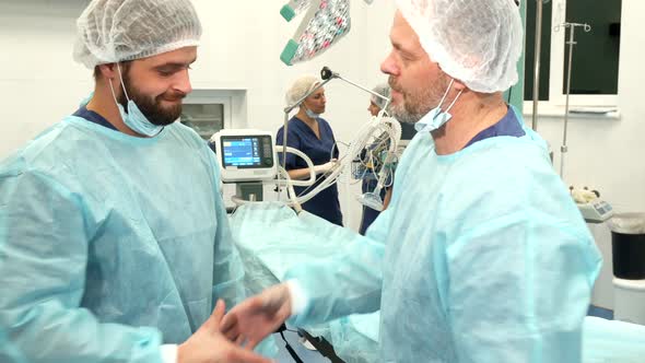 Surgeons Shake Their Hands