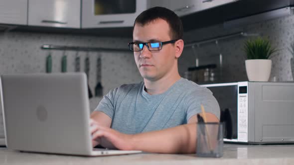 Man Freelancer, Stay at Home, Online Working, Self Isolation, Surfing Web alt