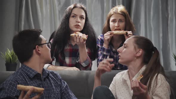 Four Friends Eating Pizza and Watching Tv Shows on Couch in Home Interior.