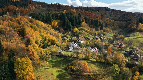 Aerial drone view of Viseu de Sus, Romania. Residential buildings on a hil alt