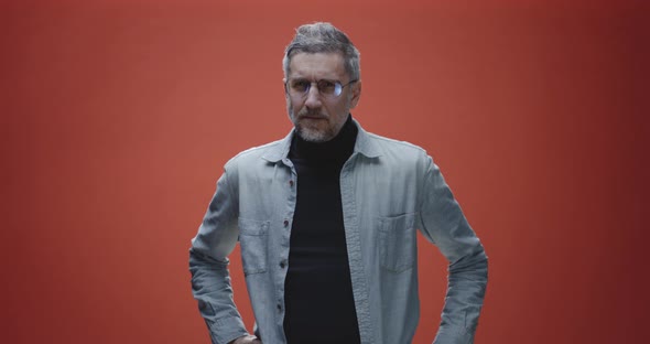 Angry Man Glaring at Camera alt