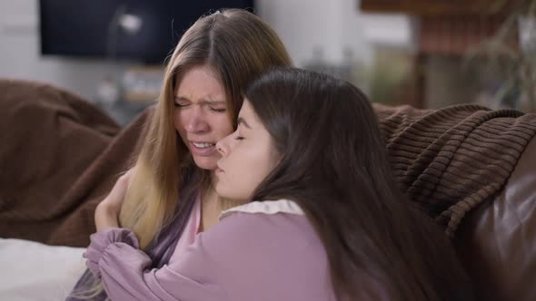 Stressed Depressed Beautiful Young Woman Crying As Empathetic Friend Hugging Calming Down Upset alt