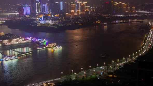 Chongqing Night City River Cityscape with Bridges Aerial China Timelapse Pan Up alt