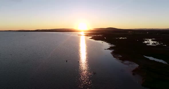 Tropical Golden Sunset Over the Ocean Water alt