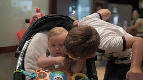 Brother playing with junior sister alt