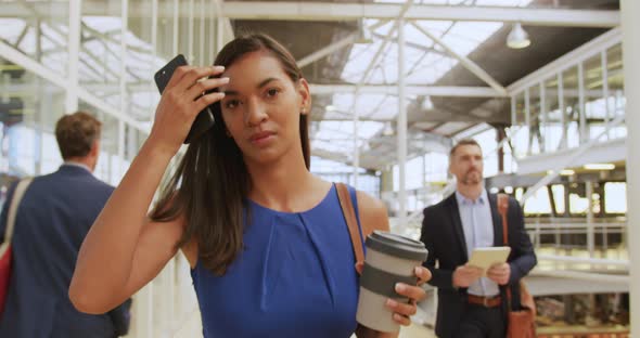 Female delegate arriving at a business convention alt