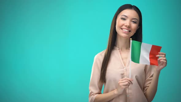 Smiling Lady Holding Italy Flag, Ready to Learn Foreign Language, Italian School alt