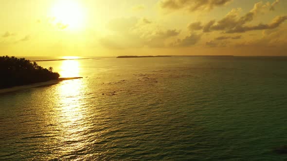 Aerial top down panorama of tranquil tourist beach time by blue sea and white sand background of adv alt