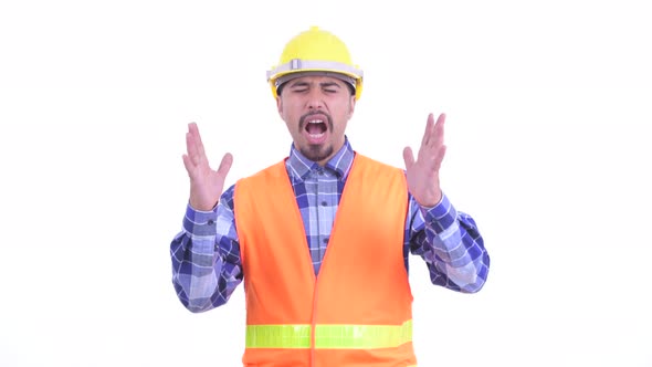 Stressed Bearded Persian Man Construction Worker Getting Bad News alt
