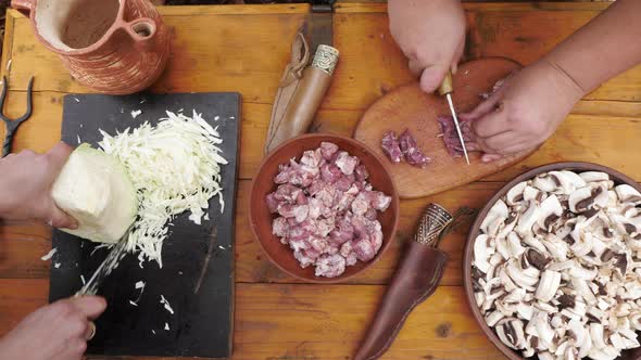 Hands slicing ingredients alt