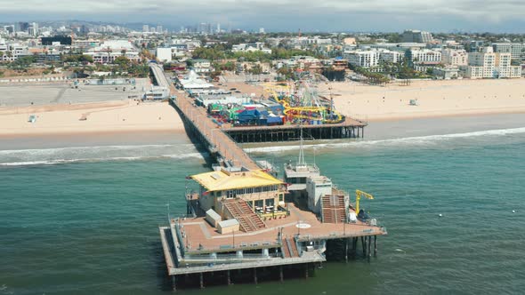 Cinematic Video of Santa Monica Pier on Sunny Day, Los Angeles, USA. Famous Pier alt