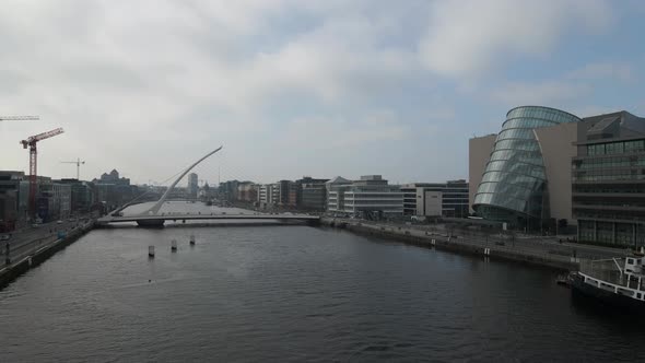 Drone shot of Dublin City Centre including the Convention Centre and the Samuel Beckett Bridge. alt