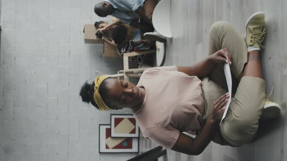 Vertical Portrait of Happy Black Woman at Home alt