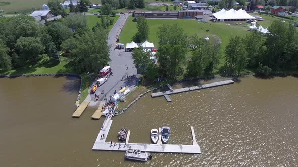 aerial busy boat launch at fairgrounds 4k alt
