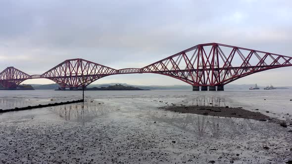 A Railway Bridge Crossing the Forth of Firth in Scotland alt