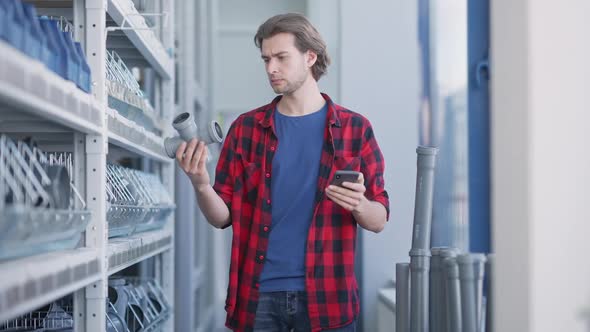 Handsome Young Man Scanning QR Code on Pipe Connectors Checking Manufacturers Online alt