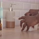 Woman Applying Cleansing Lotion on Cotton Pad in Bathroom - VideoHive Item for Sale
