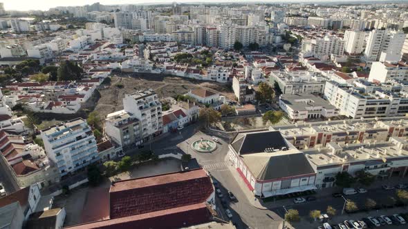 Aerial top down view Portimão residential buildings and street roads from Above - Algarve alt