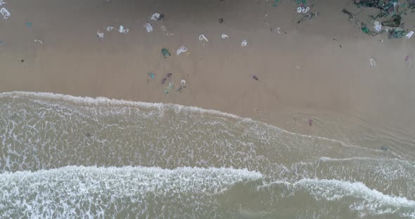 Trash, plastic, garbage, bottle... environmental pollution on the beach