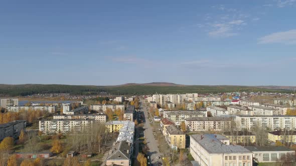 Aerial view of A small provincial Russian city with five-story buildings. Autumn sunny day. 48 alt