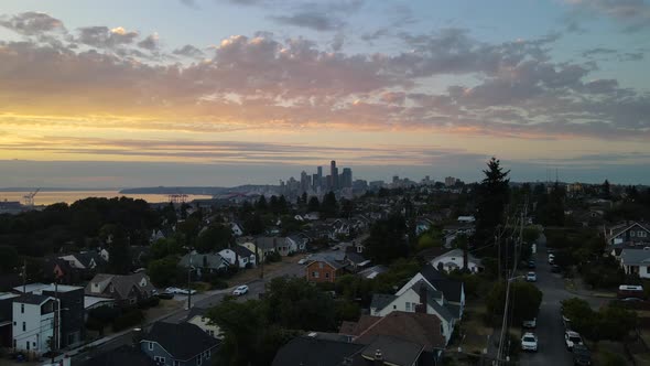 Aerial shot of a dreamy sunset over Seattle and the Puget Sound. alt