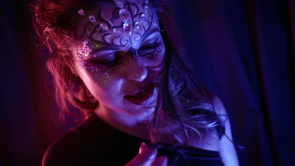 Sexy Actress with Theatrical Makeup Is Looking Seductively at Camera Closeup Portrait of Young alt