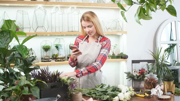 Portrait of Beautiful Woman Florist Looking at Camera alt