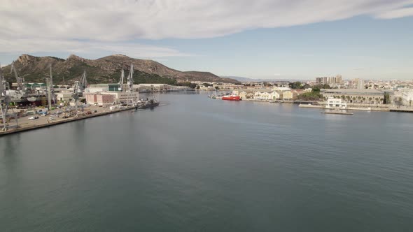 Industrial port in Cartagena, Spain. Cranes and heavy equipment. Aerial view