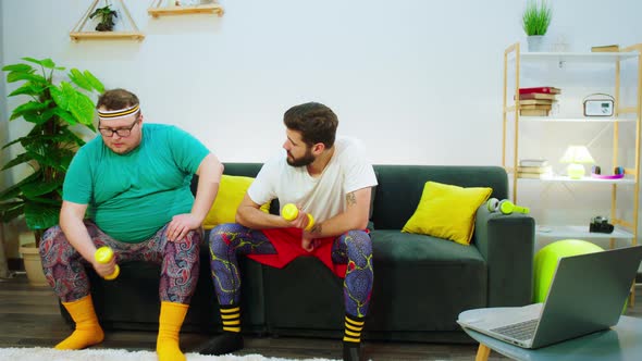 At Home Two Friends One of Them are Obese Doing alt