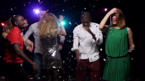 Friends Throwing Glitter Confetti and Makes Selfie at the Party alt