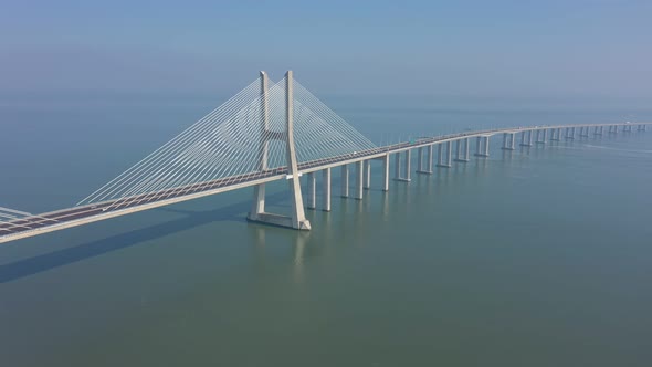 Lisbon Portugal Aerial View of the Vasco Da Gama Bridge on a Foggy Beautiful Morning During Car alt
