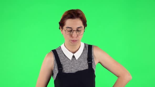 Portrait of Funny Girl in Round Glasses Is Feeling Very Bad, Her Stomach Hurting and Feeling Nausea alt