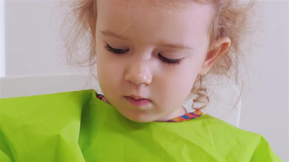 Portrait Cute Little Girl Drawing with Colored Paint on White Paper. alt