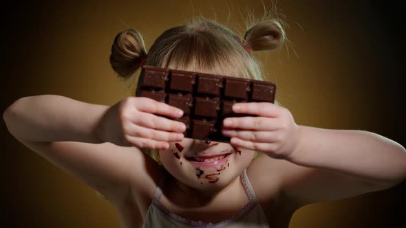 Closeup Portrait of Teen Child Kid Girl Eating Milk Chocolate Bar Addiction of Sweets and Candies, Stock Footage 