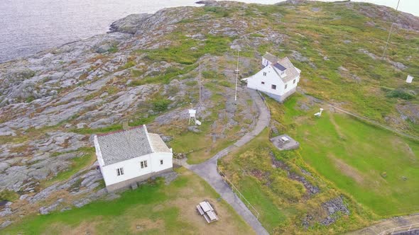 White-Colored House Structures At The Rocky Landscape Of Store Torungen Island In Arendal Town, Norw alt