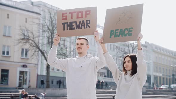 People with Raised Posters Calling to Stop the War in Ukraine
