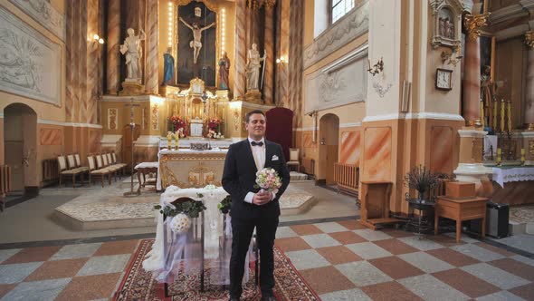 The Groom Expects His Bride During a Wedding in the Catholic Church alt