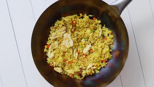 Delicious Thai Dish in Hot Wok Fried Chicken with Rice and Vegetables alt