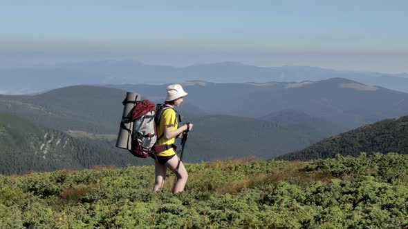 Tourist walking on top of mountain. Hikers travel enjoy life scenic nature landscape alt