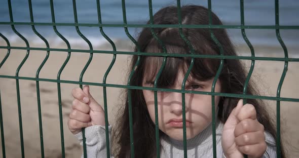 Alone Child By Sea in Pandemic alt