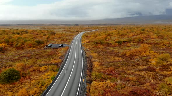 Aerial View of a Road Among the Autumn Icelandic Landscape, National Park Thingvellir alt