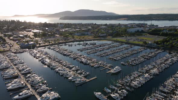 Backward Aerial Of Boats Docked At Cap Sante Marina In Anacortes Washington alt