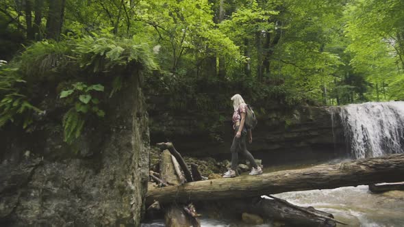 Tourist Girl With Backpack alt
