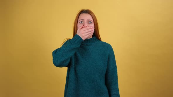 Young Red Hair Woman Posing Isolated on Yellow Color Background Studio alt