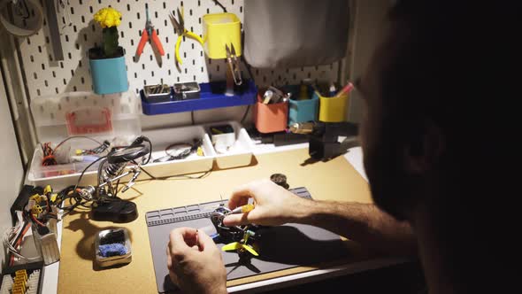 Man Repair DIY FPV Drone