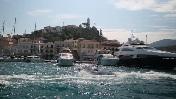 View From the Sea to the Poros Marina Sea Port Greece alt